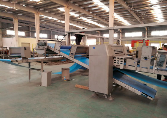 acheter Solution clés en main de pétrisseuse de pâte feuilletée de capacité de ZKS 1200-1500kg/heure avec le four de Proffer et tunnel fabrication en ligne